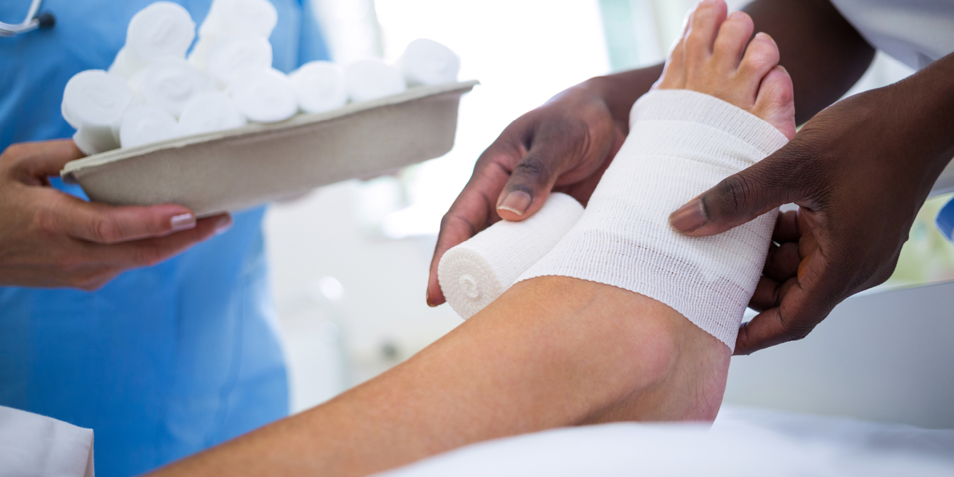 patient's foot being wrapped by medical staff